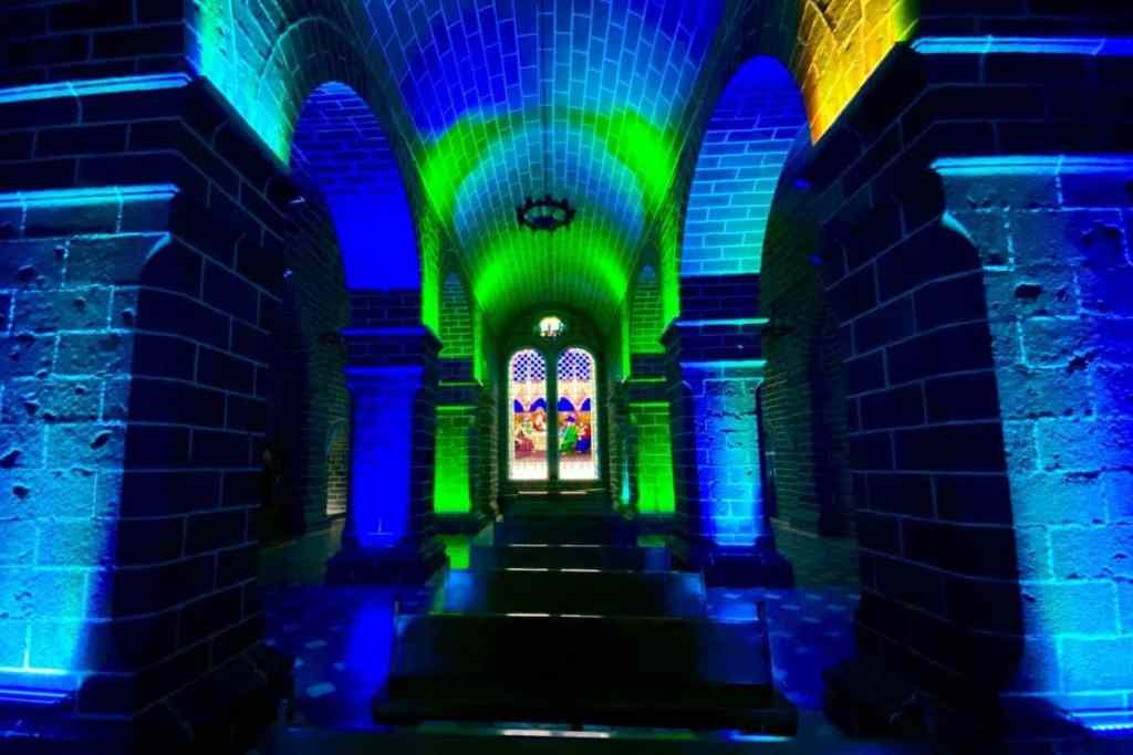 The crypt in the basement of Las Lajas Sanctuary Colombia is illuminated with color-changing lights